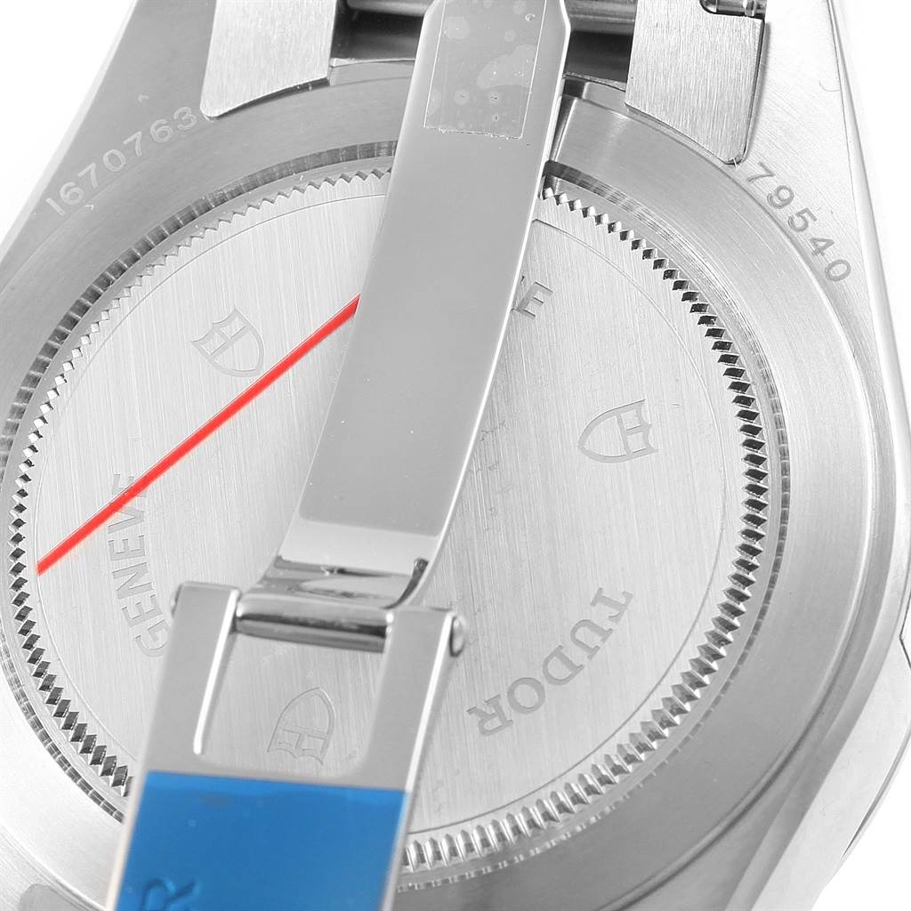 This image shows the backside of the Tudor Heritage Black Bay 79540 Men
s Stainless Steel Black Dial 79540 Men
s Stainless Steel Black Dial watch with its clasp and caseback visible.