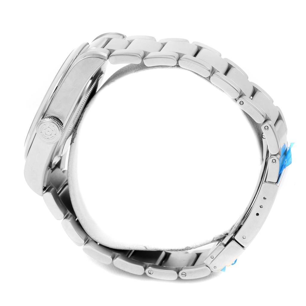 This side-angle view of the Tudor Heritage Black Bay 79540 Men
s Stainless Steel Black Dial 79540 Men
s Stainless Steel Black Dial watch shows the steel case, crown, and bracelet.