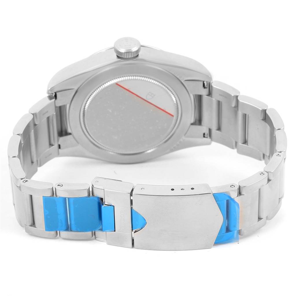 This image shows the back of the Tudor Heritage Black Bay 79540 Men
s Stainless Steel Black Dial 79540 Men
s Stainless Steel Black Dial watch, focusing on the case back, crown, and partially closed bracelet with a clasp.