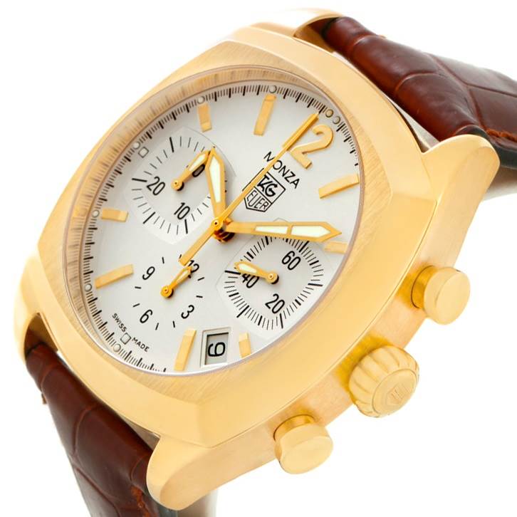 The image shows a side angle of the Tag Heuer Monza CR514A.FC8145 Men's Yellow Gold Silver Dial CR514A.FC8145 Men's Yellow Gold Silver Dial watch, highlighting its golden case, white dial, subdials, and brown leather strap.
