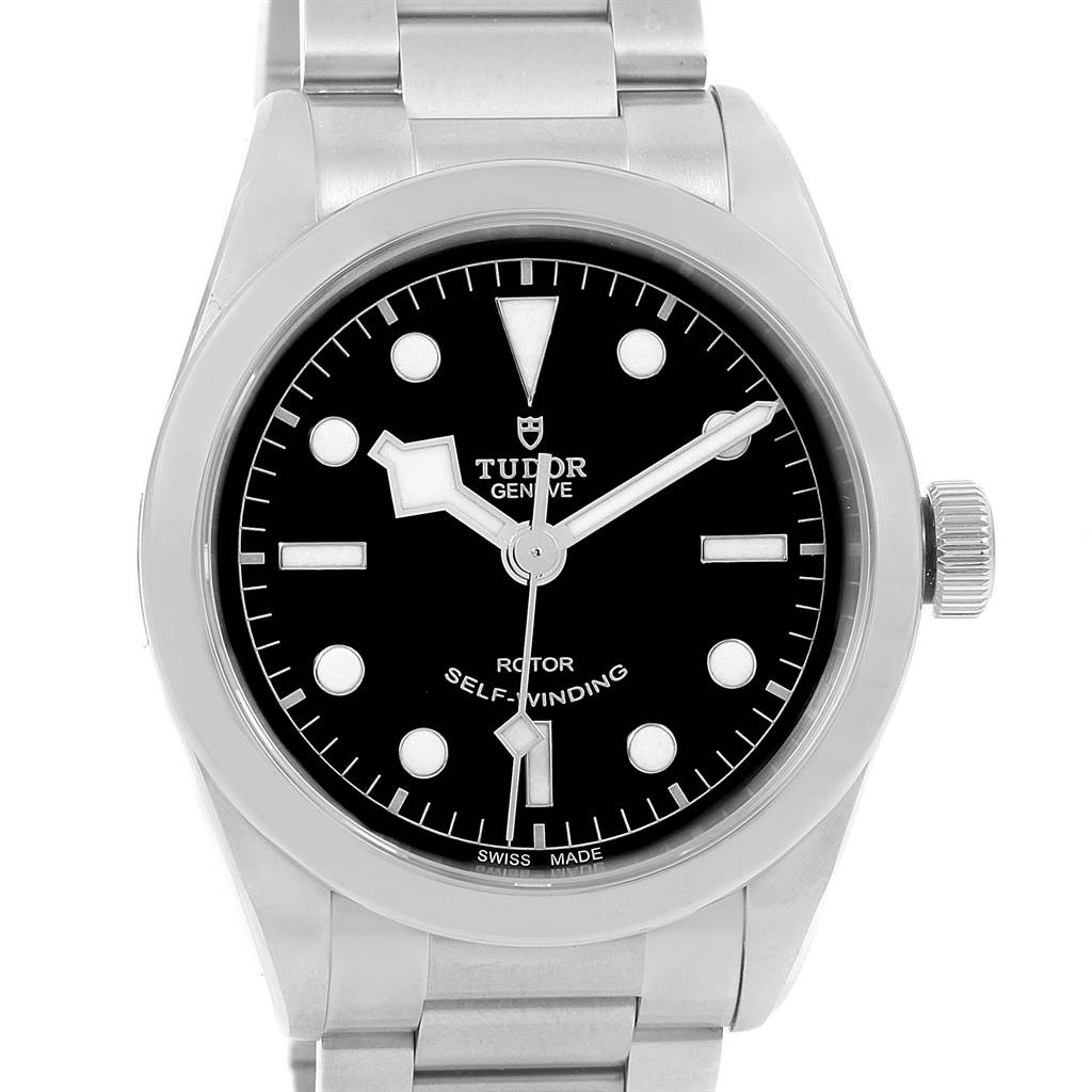 This is a front view of the Tudor Heritage Black Bay 79500 Men's Stainless Steel Black Dial 79500 Men's Stainless Steel Black Dial watch showcasing the dial, bezel, and part of the bracelet.