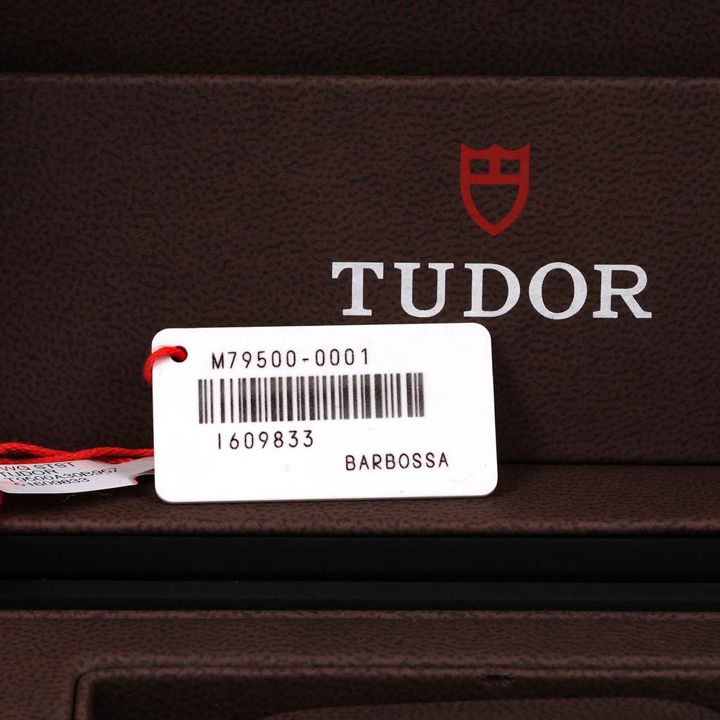 The image shows a price tag and packaging box for a Tudor Heritage Black Bay 79500 Men's Stainless Steel Black Dial 79500 Men's Stainless Steel Black Dial watch.