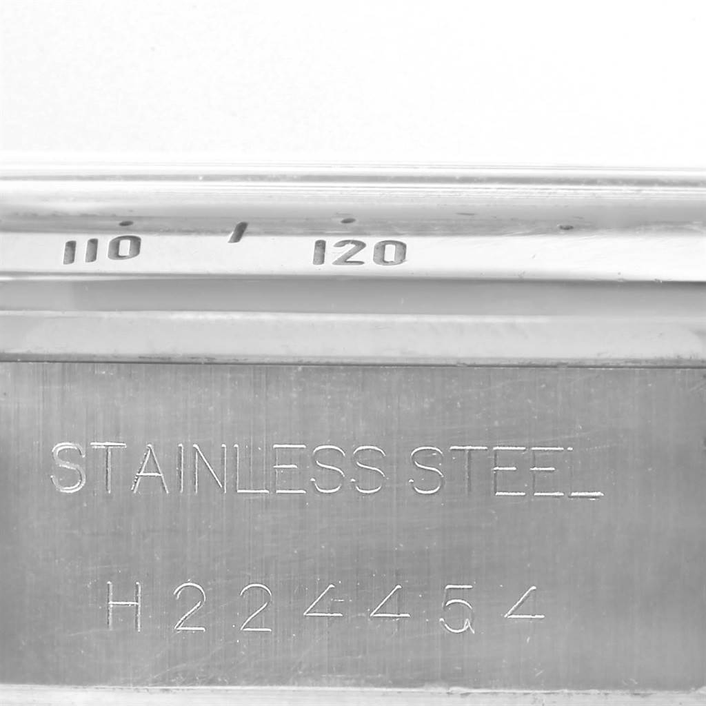 This image shows the side view of the bezel and case back of a Tudor Tiger 79280 Men's Stainless Steel Black Dial 79280 Men's Stainless Steel Black Dial model watch, highlighting the serial engravings.