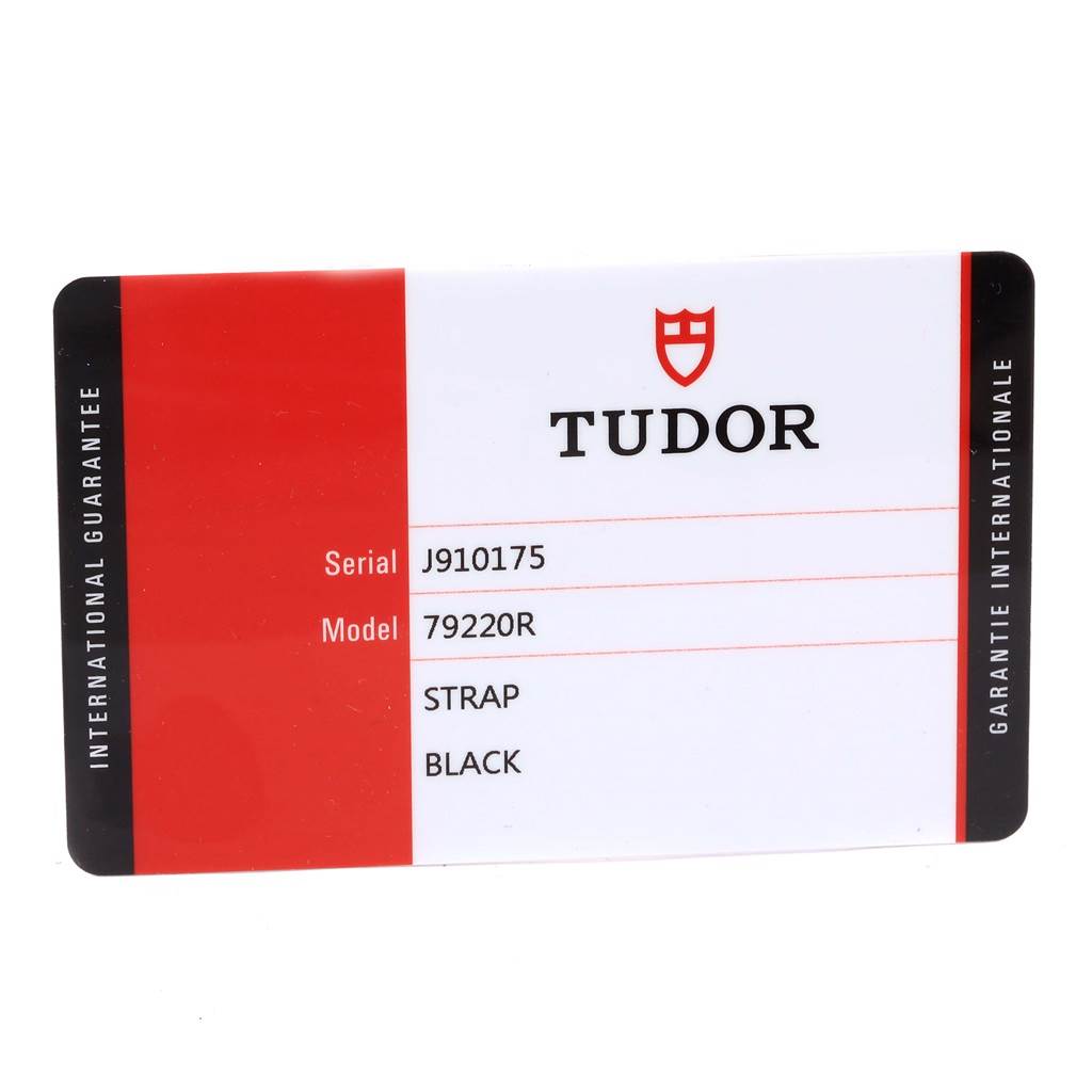 This is a warranty card for the Tudor Heritage Black Bay 79220R Men's Stainless Steel Black Dial 79220R Men's Stainless Steel Black Dial model 79220R with a black strap.