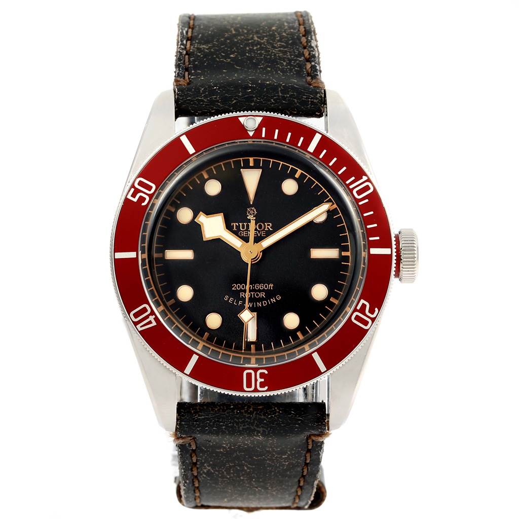 The image shows a frontal view of the Tudor Heritage Black Bay 79220R Men's Stainless Steel Black Dial 79220R Men's Stainless Steel Black Dial watch, highlighting its face, bezel, and leather strap.