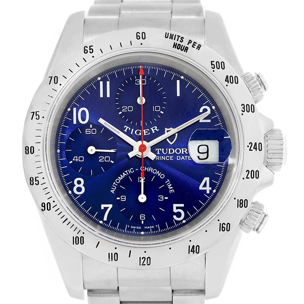 The Tudor Tiger 79280 Men's Stainless Steel Blue Dial 79280 Men's Stainless Steel Blue Dial watch is shown from a front angle, displaying its blue dial, chronograph features, date window, and stainless steel band.