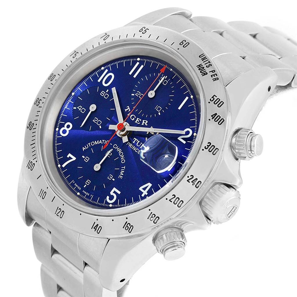 This image shows a close-up angle of the Tudor Tiger 79280 Men's Stainless Steel Blue Dial 79280 Men's Stainless Steel Blue Dial model watch, highlighting its blue dial, bezel, and side crowns.