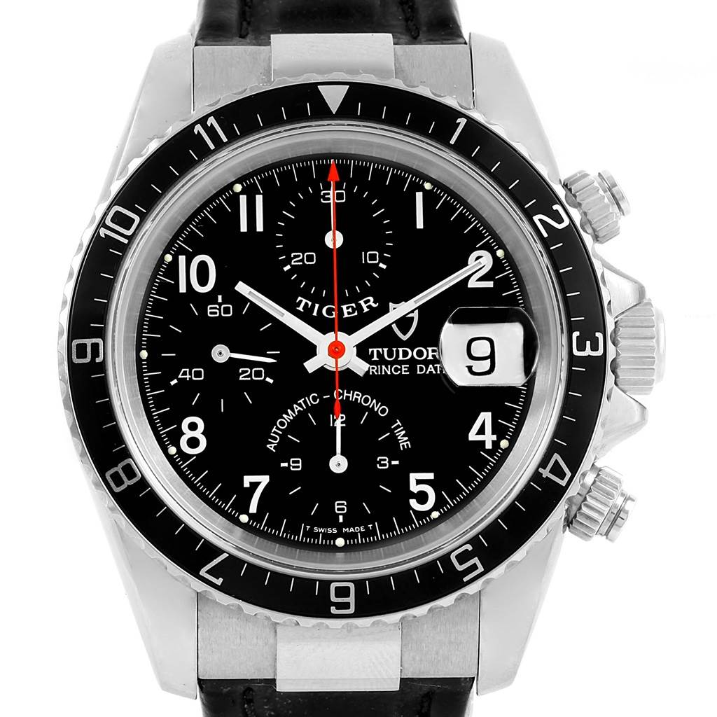 The image shows a front view of the Tudor Tiger 79260 Men's Stainless Steel Black Dial 79260 Men's Stainless Steel Black Dial watch face and bezel with chronograph dials and a date window.
