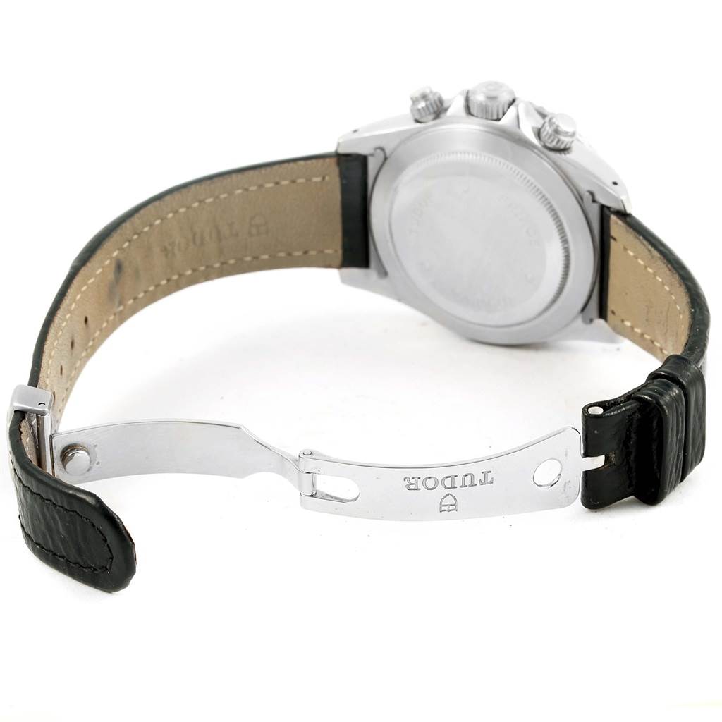 This image shows a Tudor Tiger 79260 Men's Stainless Steel Black Dial 79260 Men's Stainless Steel Black Dial model watch from the back, highlighting the clasp and leather strap.