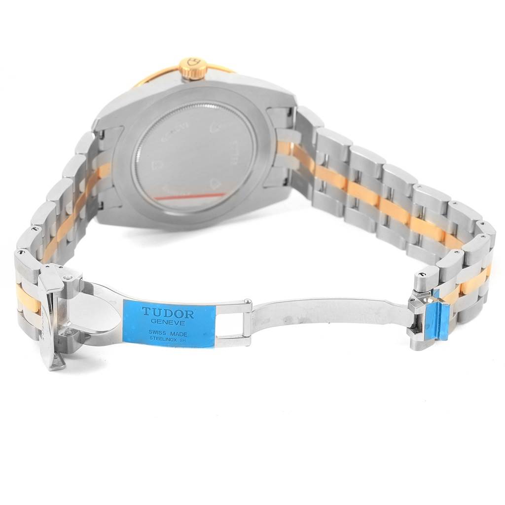 The image showcases the backside and clasp of the Tudor Glamour 57003-0006 Men's Steel and Gold (two tone) Silver Dial 57003-0006 Men's Steel and Gold (two tone) Silver Dial model, highlighting the bracelet and closure mechanism.