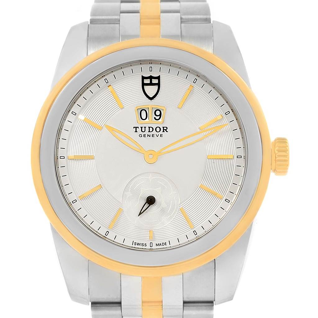 This image shows a front view of the Tudor Glamour 57003-0006 Men's Steel and Gold (two tone) Silver Dial 57003-0006 Men's Steel and Gold (two tone) Silver Dial watch, displaying the face, bezel, crown, and part of the bracelet.