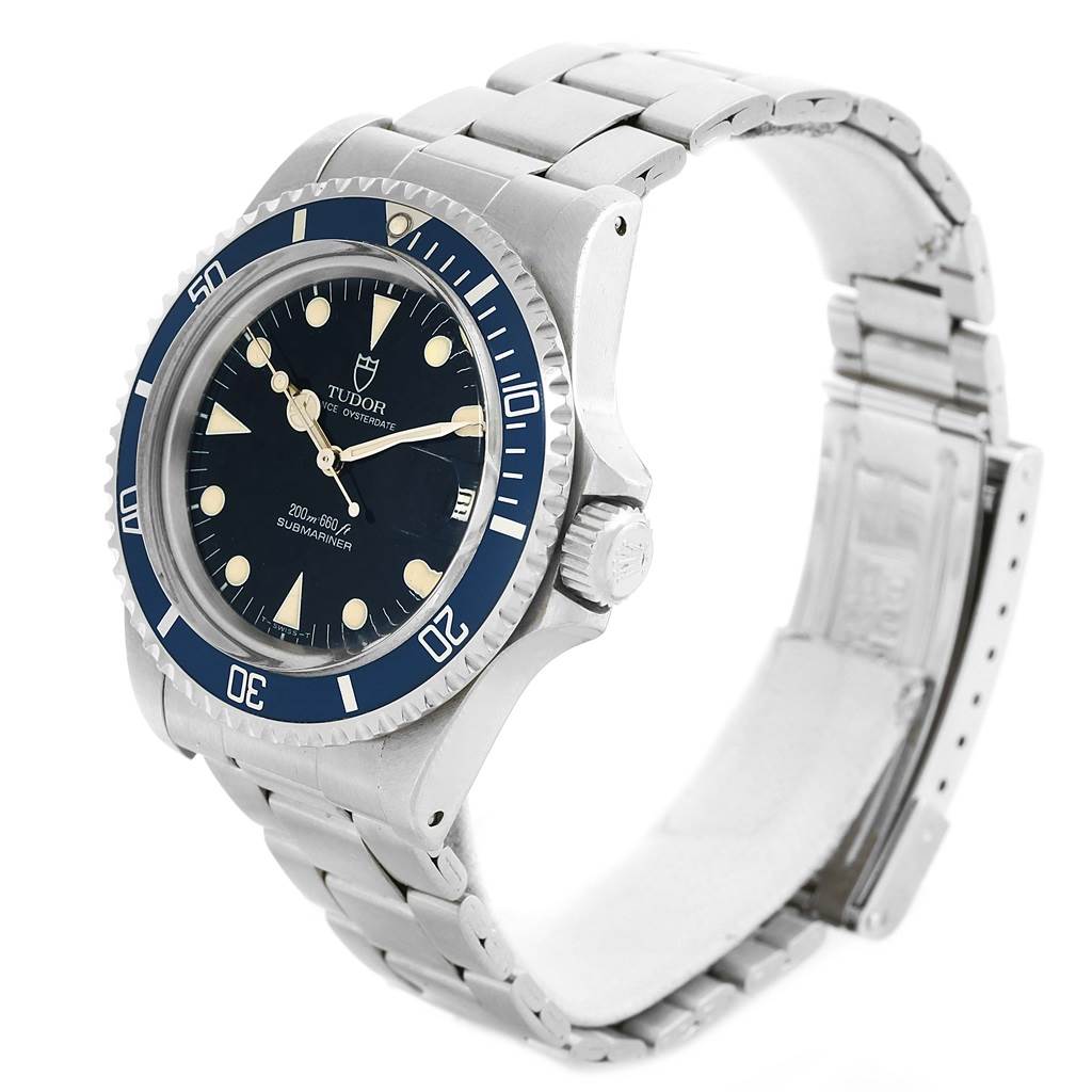 The Tudor Submariner 79090 Men's Stainless Steel Black Dial 79090 Men's Stainless Steel Black Dial watch is shown from a front angle, highlighting its face, bezel, crown, and bracelet.