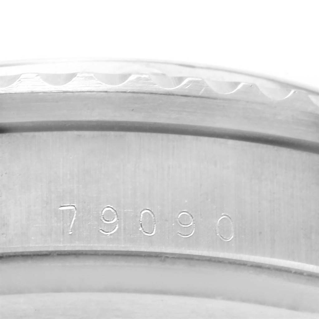 The image shows a close-up of the case back and bezel edge of a Tudor Submariner 79090 Men's Stainless Steel Black Dial 79090 Men's Stainless Steel Black Dial model watch, featuring the engraved model number "79090".