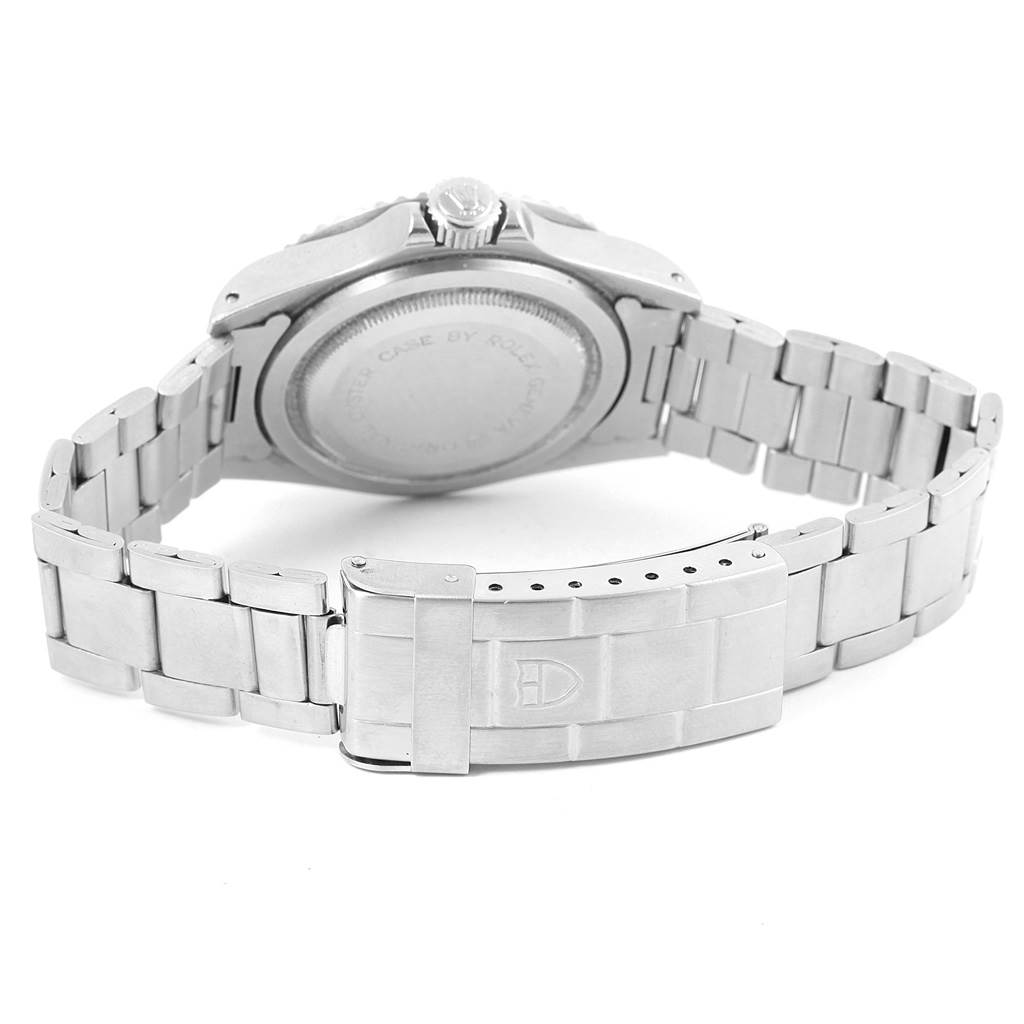 The image shows the back case and open clasp of a Tudor Submariner 79090 Men's Stainless Steel Black Dial 79090 Men's Stainless Steel Black Dial watch, with the bracelet band partially extended.