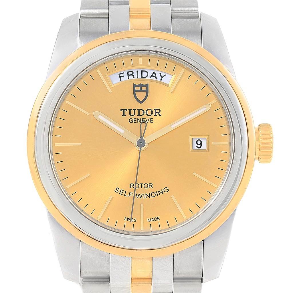 This image shows a frontal view of the Tudor Glamour 56003 Men's Steel and Gold (two tone) Champagne Dial 56003 Men's Steel and Gold (two tone) Champagne Dial watch, displaying the dial, day/date features, and part of the bracelet.