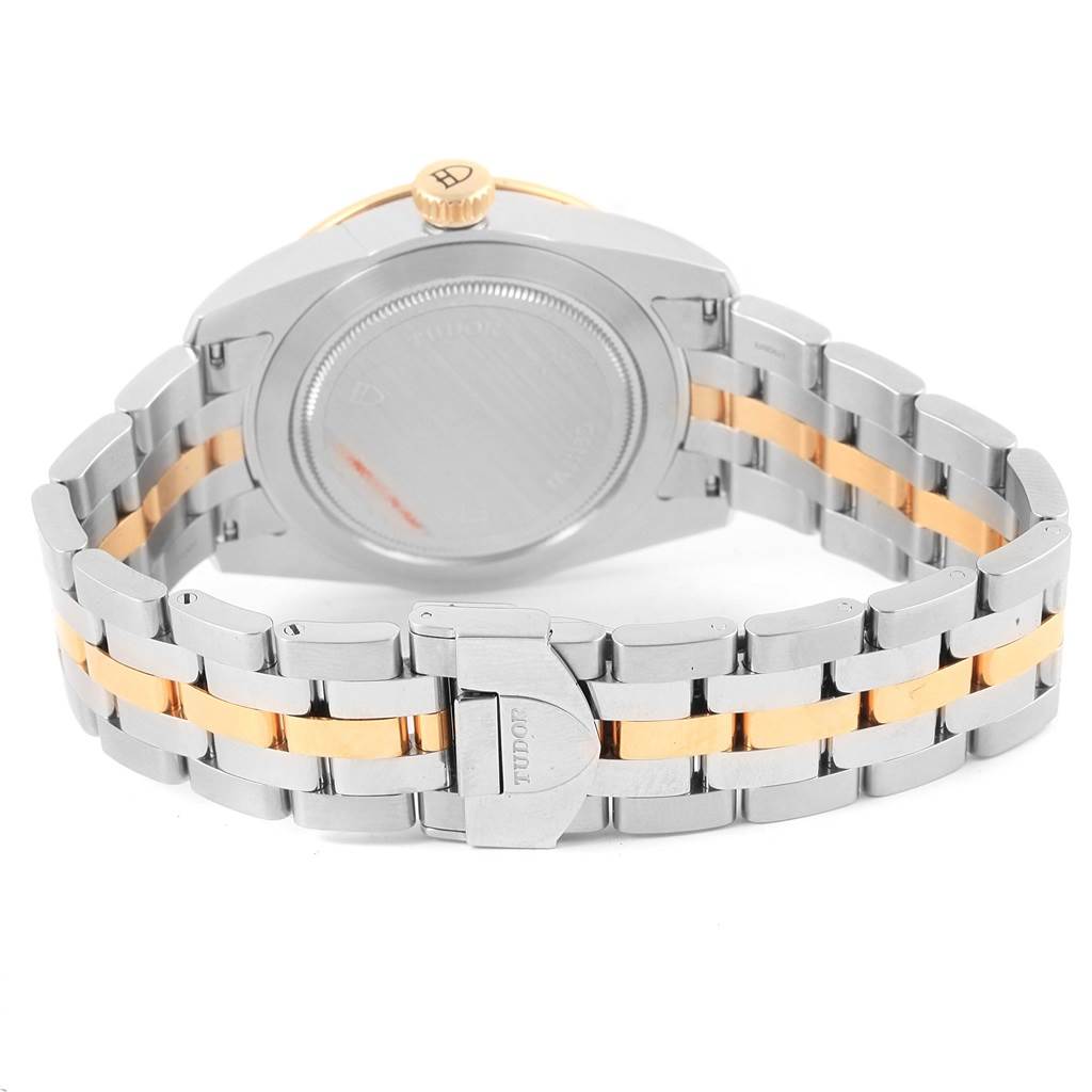 The image shows the back view of the Tudor Glamour 56003 Men's Steel and Gold (two tone) Champagne Dial 56003 Men's Steel and Gold (two tone) Champagne Dial model watch, highlighting the case back, clasp, and the two-tone bracelet.