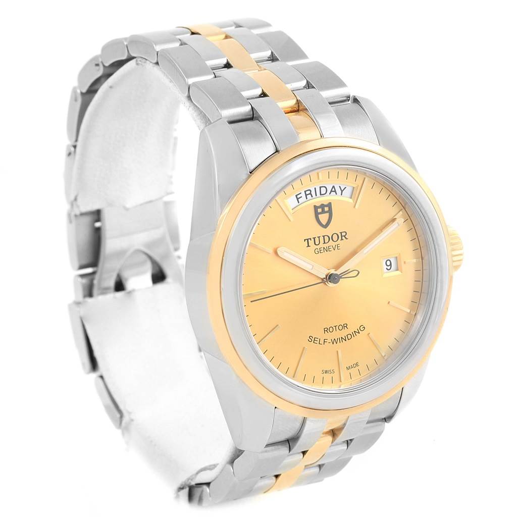 This image shows a Tudor Glamour 56003 Men's Steel and Gold (two tone) Champagne Dial 56003 Men's Steel and Gold (two tone) Champagne Dial model watch at a side angle, highlighting its face, bracelet, and clasp.