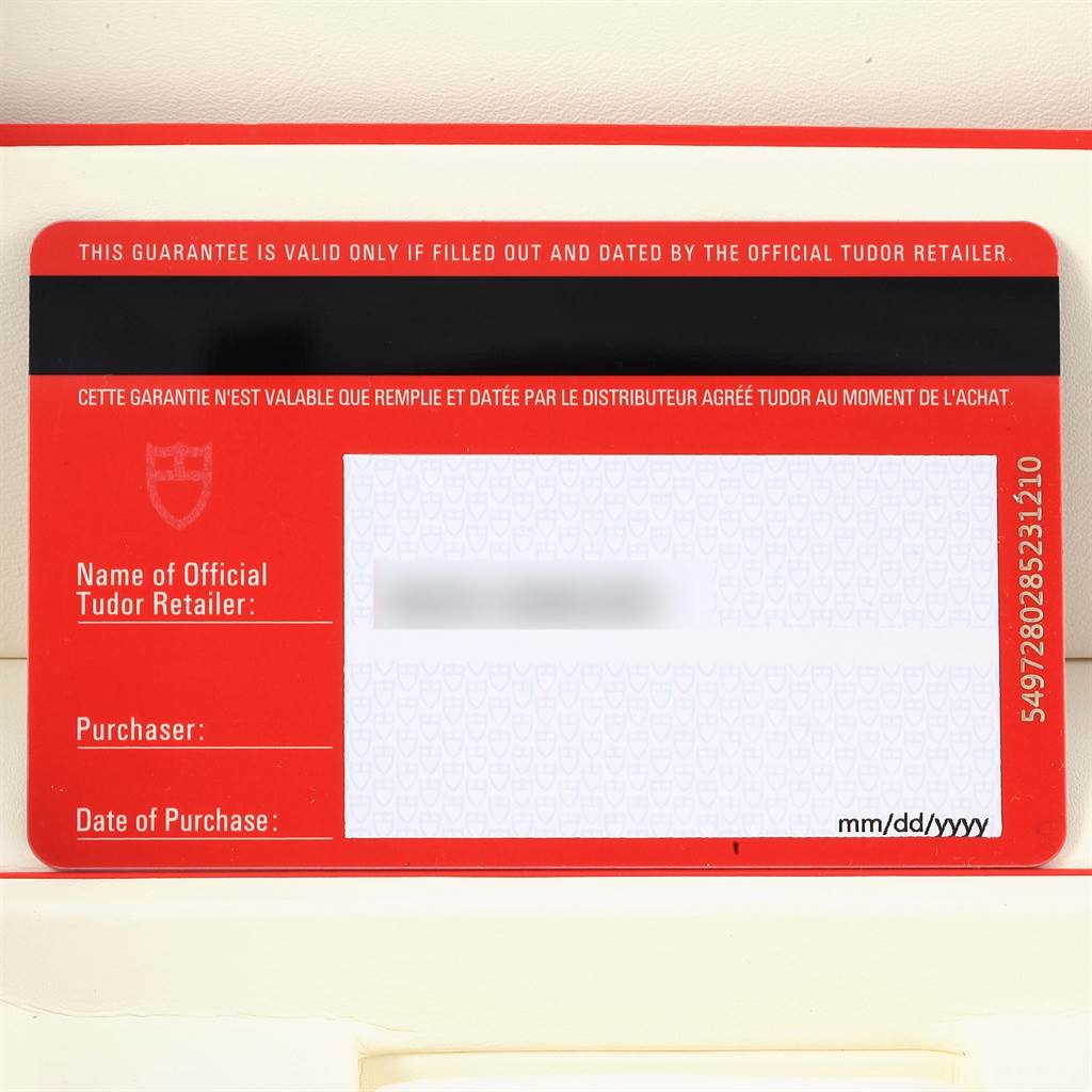 The image shows a warranty card for the Tudor Glamour 56003 Men's Steel and Gold (two tone) Champagne Dial 56003 Men's Steel and Gold (two tone) Champagne Dial model watch from a front angle.