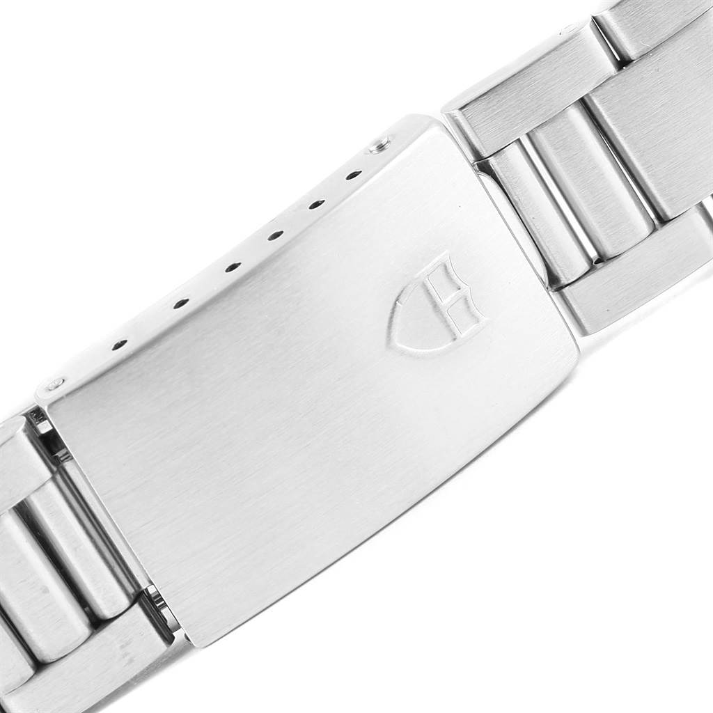 This is a close-up view of the metal clasp and bracelet of the Tudor Tiger 79280 Men's Stainless Steel Burgundy Dial 79280 Men's Stainless Steel Burgundy Dial watch.