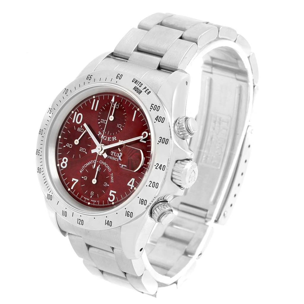 The image shows a Tudor Tiger 79280 Men's Stainless Steel Burgundy Dial 79280 Men's Stainless Steel Burgundy Dial model watch at a three-quarter angle, highlighting the bracelet, bezel, and red dial face.