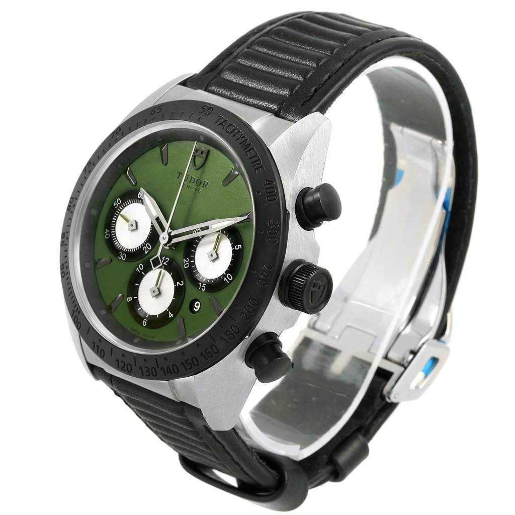 The Tudor Fastrider 42010N Men
s Stainless Steel Green Dial 42010N Men
s Stainless Steel Green Dial watch is shown at an angle highlighting the green dial, subdials, bezel, and black strap.