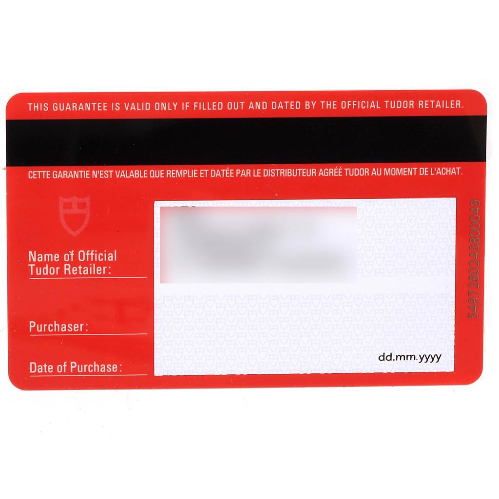 This image shows the warranty card for a Tudor Fastrider 42010N Men
s Stainless Steel Green Dial 42010N Men
s Stainless Steel Green Dial watch, featuring fields for the retailer
s name, purchaser, and date of purchase.