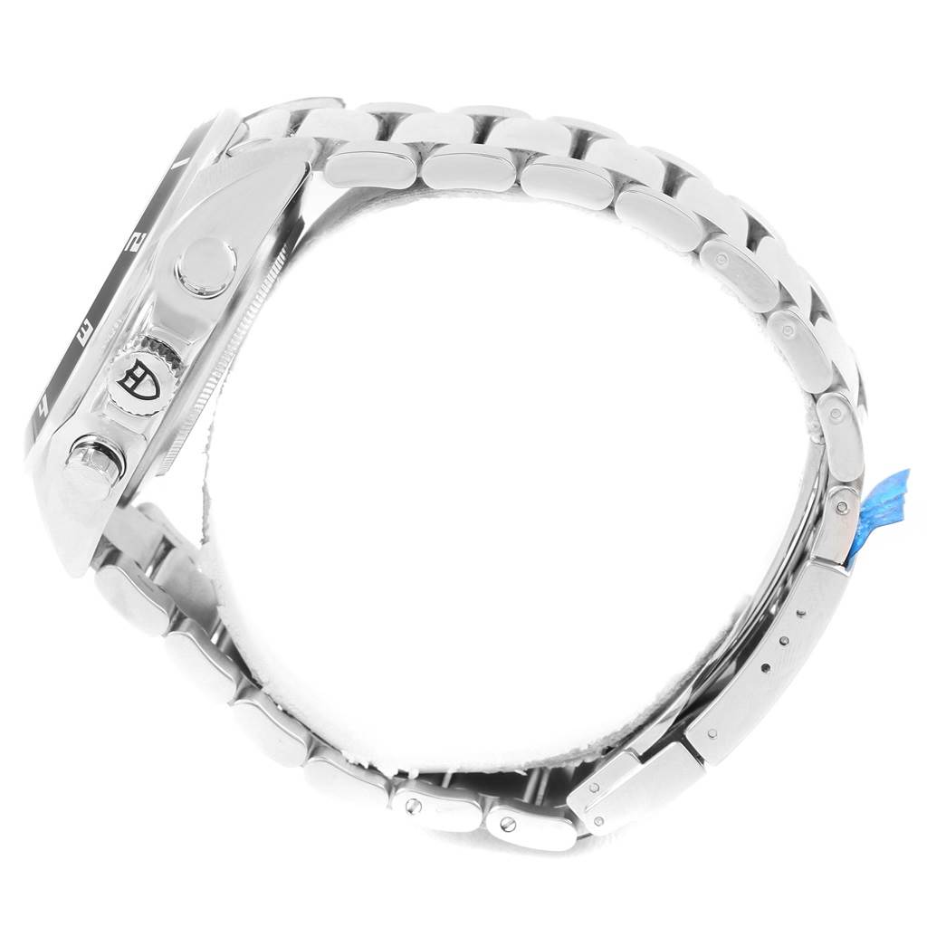 This side-angle view of the Tudor Grantour 20530N-95730 Men's Stainless Steel Black Dial 20530N-95730 Men's Stainless Steel Black Dial watch shows the crown, pushers, and stainless steel bracelet.