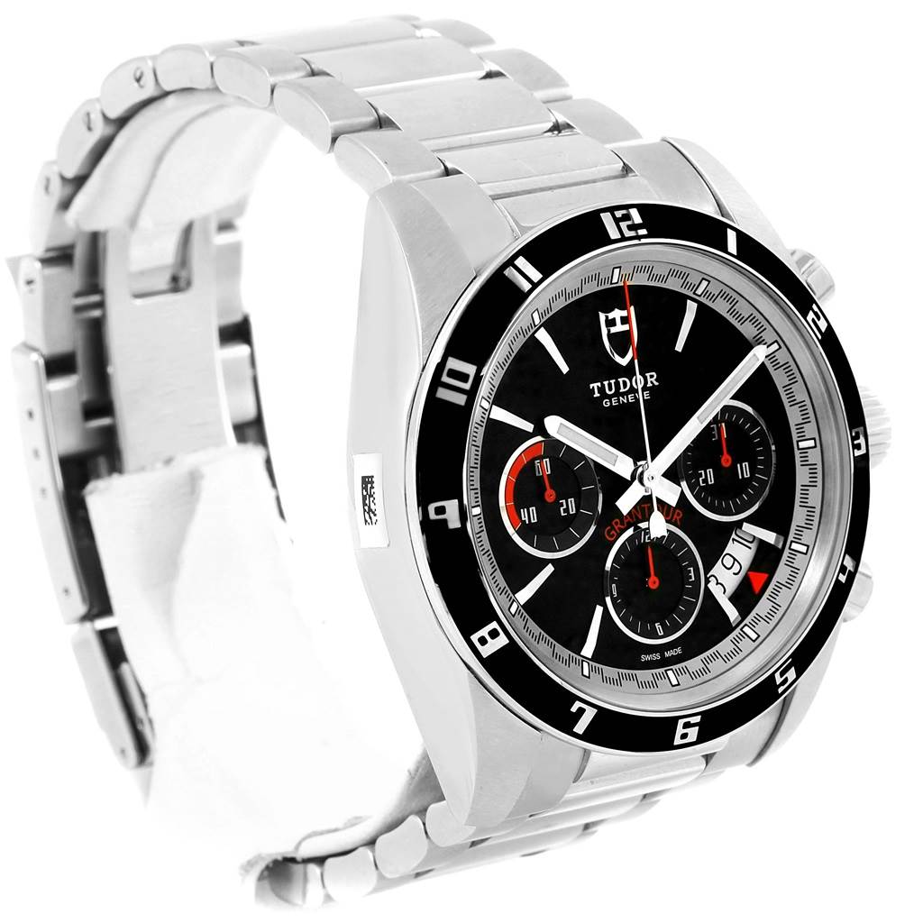 This image displays the Tudor Grantour 20530N-95730 Men's Stainless Steel Black Dial 20530N-95730 Men's Stainless Steel Black Dial watch at a three-quarter angle, showing the face, bezel, and metal bracelet.
