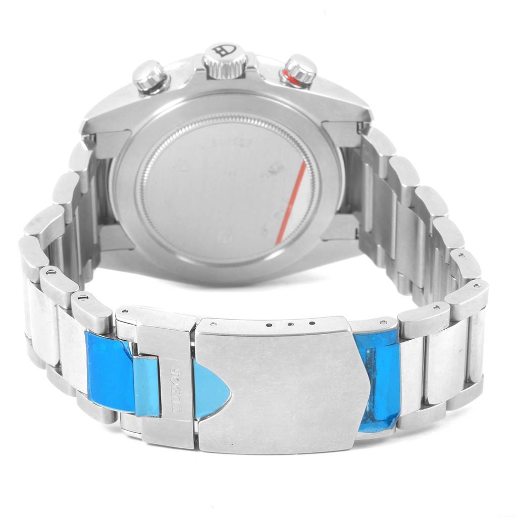 The image shows the back case and bracelet clasp of a Tudor Grantour 20550N Men
s Stainless Steel Black Dial 20550N Men
s Stainless Steel Black Dial watch, viewed from the back.