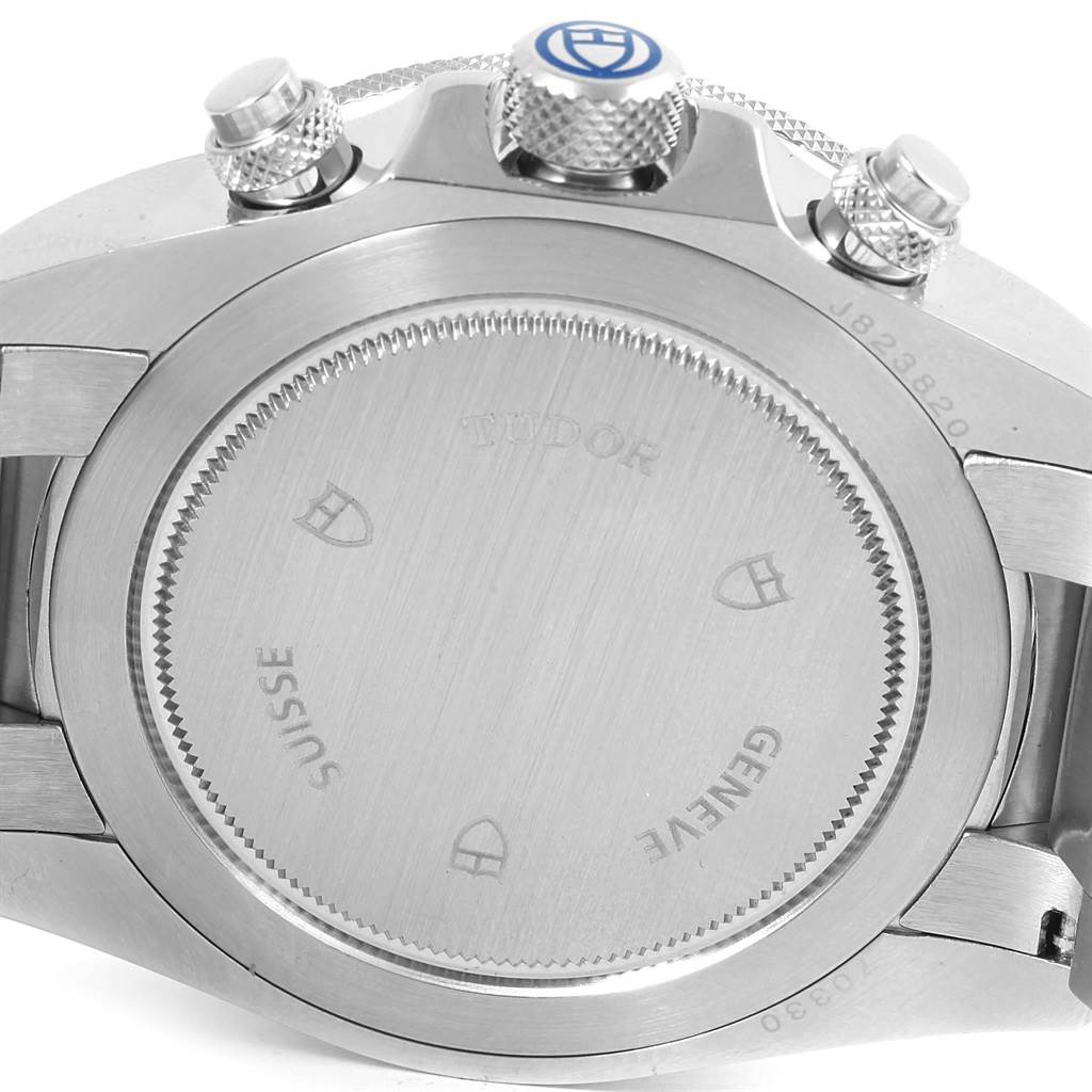 The image shows the back case and crown of the Tudor Heritage Chrono 70330 Men's Stainless Steel Blue Dial 70330 Men's Stainless Steel Blue Dial watch.