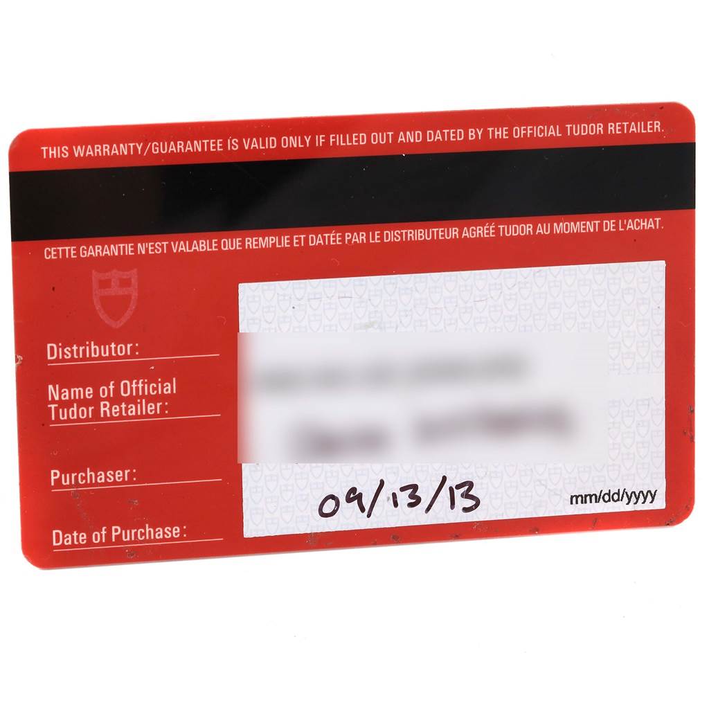 This image shows a warranty card for the Tudor Heritage Chrono 70330 Men's Stainless Steel Blue Dial 70330 Men's Stainless Steel Blue Dial model, viewed from the front and filled out with purchase details.