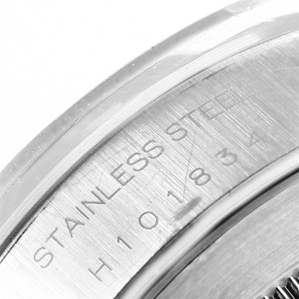 This image shows a close-up of the stainless steel case back of a Tudor Tiger 79280 Men's Stainless Steel Blue Dial 79280 Men's Stainless Steel Blue Dial watch, featuring part of its serial number.