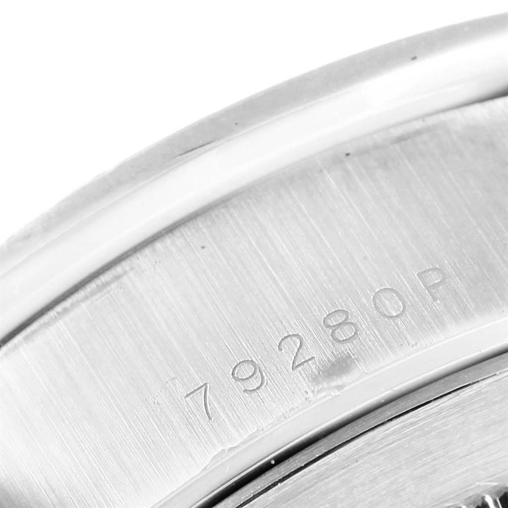 The image shows a close-up of the serial number engraved on the back of a Tudor Tiger 79280 Men's Stainless Steel Blue Dial 79280 Men's Stainless Steel Blue Dial model watch.