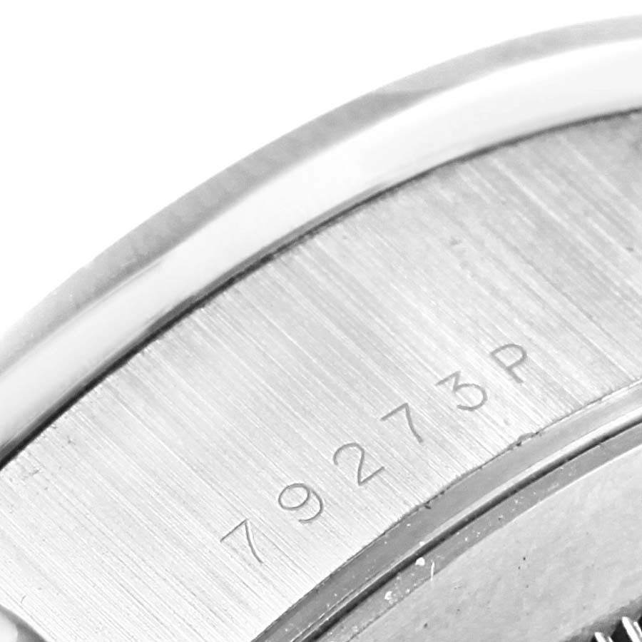 The image shows a close-up of the case back with the serial number of a Tudor Tiger 79273 Men's Stainless Steel White Dial 79273 Men's Stainless Steel White Dial model watch.