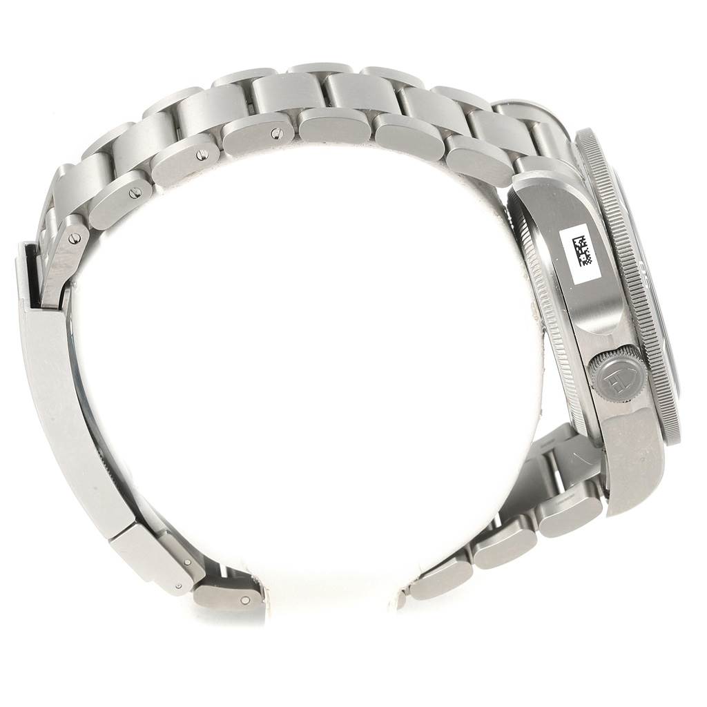 The image shows a side view of the Tudor Pelagos 25610TNL Men's Titanium Black Dial 25610TNL Men's Titanium Black Dial watch, focusing on its stainless steel bracelet and watch case.