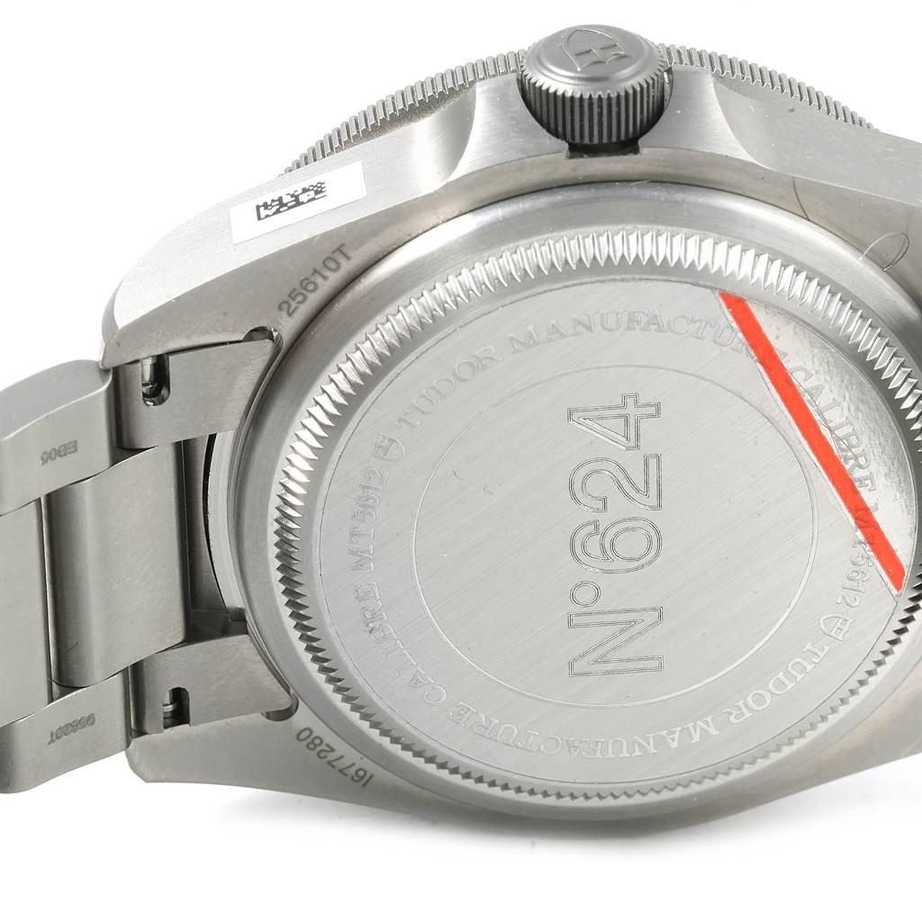 The image shows the back case and part of the stainless steel bracelet of a Tudor Pelagos 25610TNL Men's Titanium Black Dial 25610TNL Men's Titanium Black Dial watch.