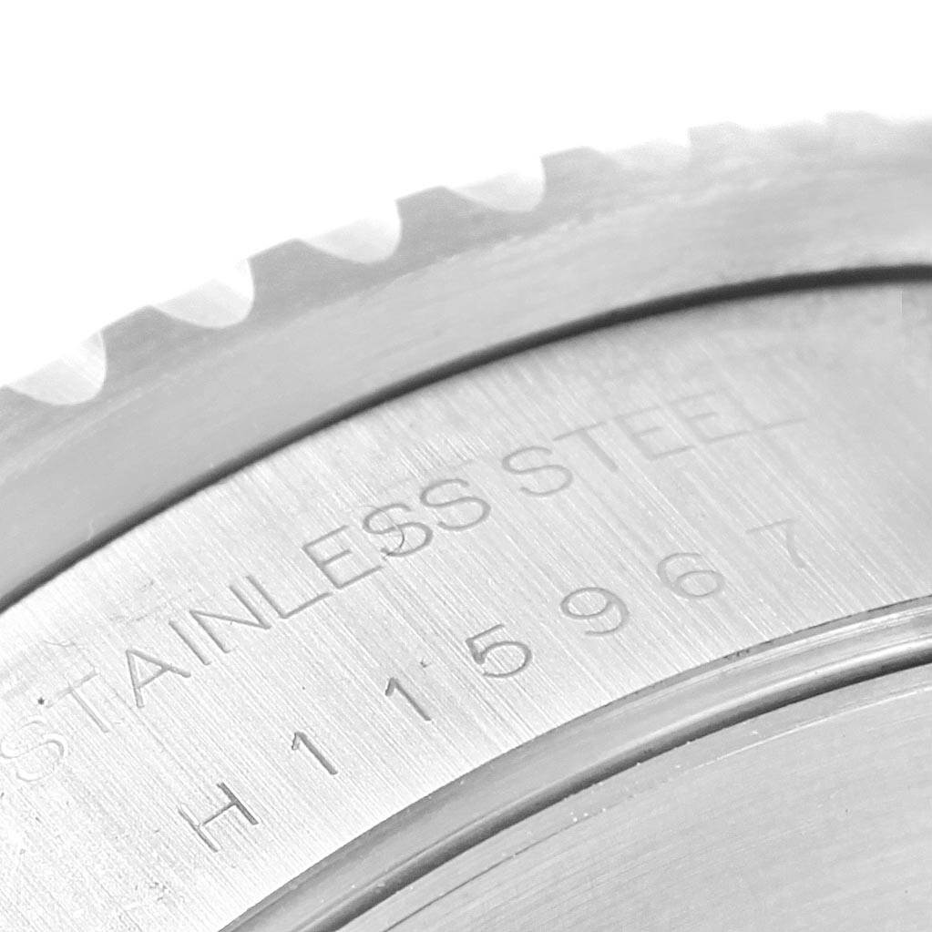 The close-up image shows the stainless steel back casing and engraved serial of the Tudor Tiger 79270 Men's Stainless Steel White Dial 79270 Men's Stainless Steel White Dial model watch.