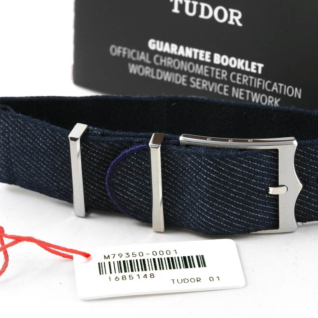Photo shows a navy blue fabric strap with a stainless steel buckle for the Tudor Heritage Black Bay 79350 Men's Stainless Steel Black Dial 79350 Men's Stainless Steel Black Dial watch.