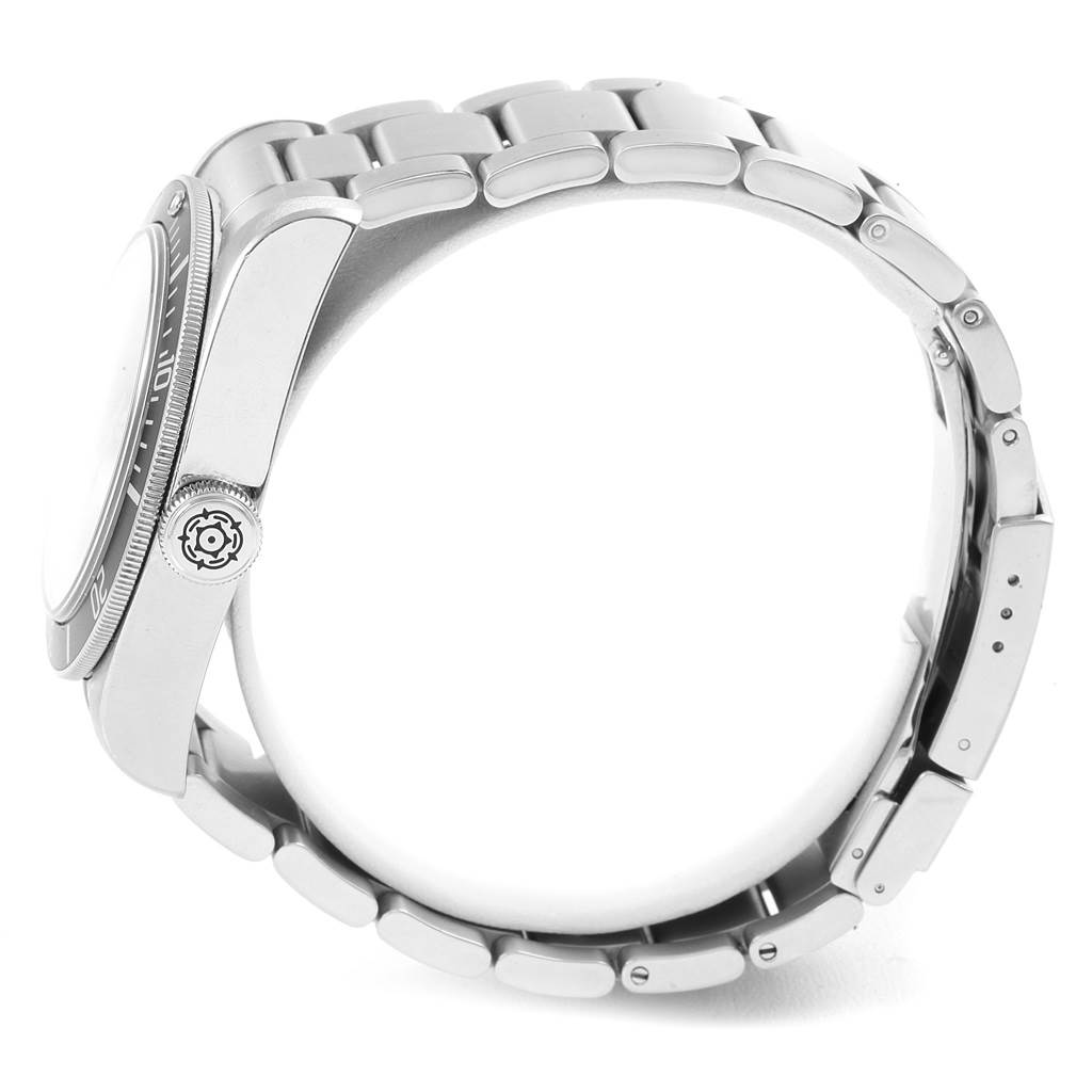 The image shows a side view of the Tudor Heritage Black Bay 79220N Men's Stainless Steel Black Dial 79220N Men's Stainless Steel Black Dial watch, displaying the case, crown, and bracelet.