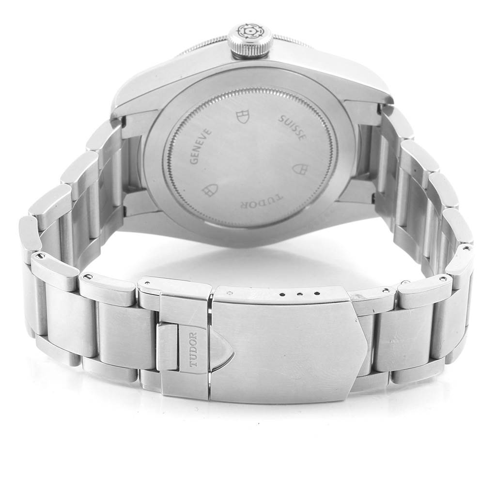 The image shows the back case and bracelet of a Tudor Heritage Black Bay 79220N Men's Stainless Steel Black Dial 79220N Men's Stainless Steel Black Dial watch, focusing on the clasp and links.