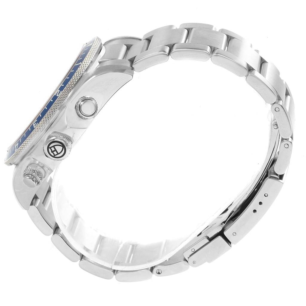 The image shows the side profile of the Tudor Heritage Chrono 70330 Men's Stainless Steel Blue Dial 70330 Men's Stainless Steel Blue Dial watch, highlighting the bezel, crown, pushers, and bracelet.