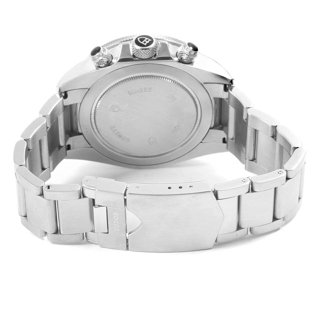 The image shows the back view of a Tudor Heritage Chrono 70330N Men's Stainless Steel Grey Dial 70330N Men's Stainless Steel Grey Dial watch, including the case back, crown, pushers, and the stainless steel bracelet with clasp.