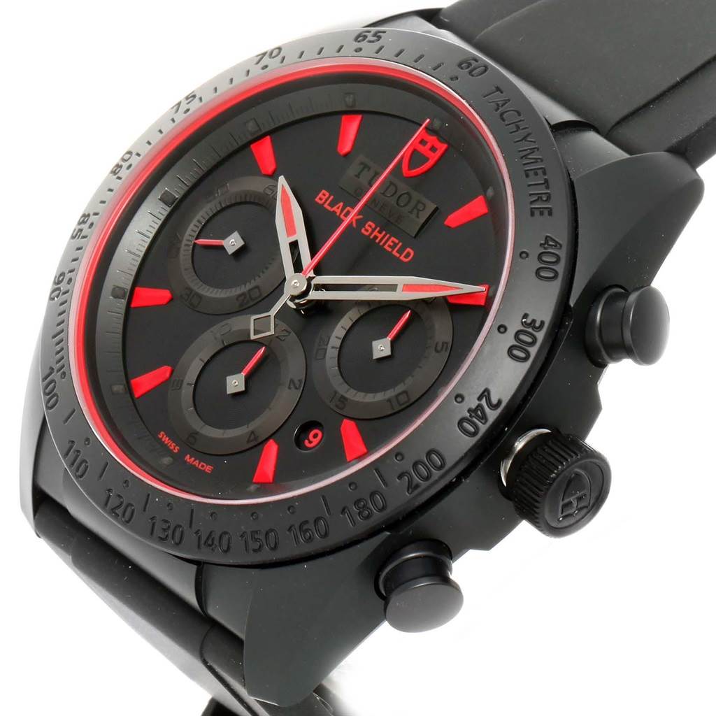 The image shows the dial and side buttons of the Tudor Fastrider 42000CR-0002 Men's Stainless Steel Black Dial 42000CR-0002 Men's Stainless Steel Black Dial Black Shield watch at an angled view.