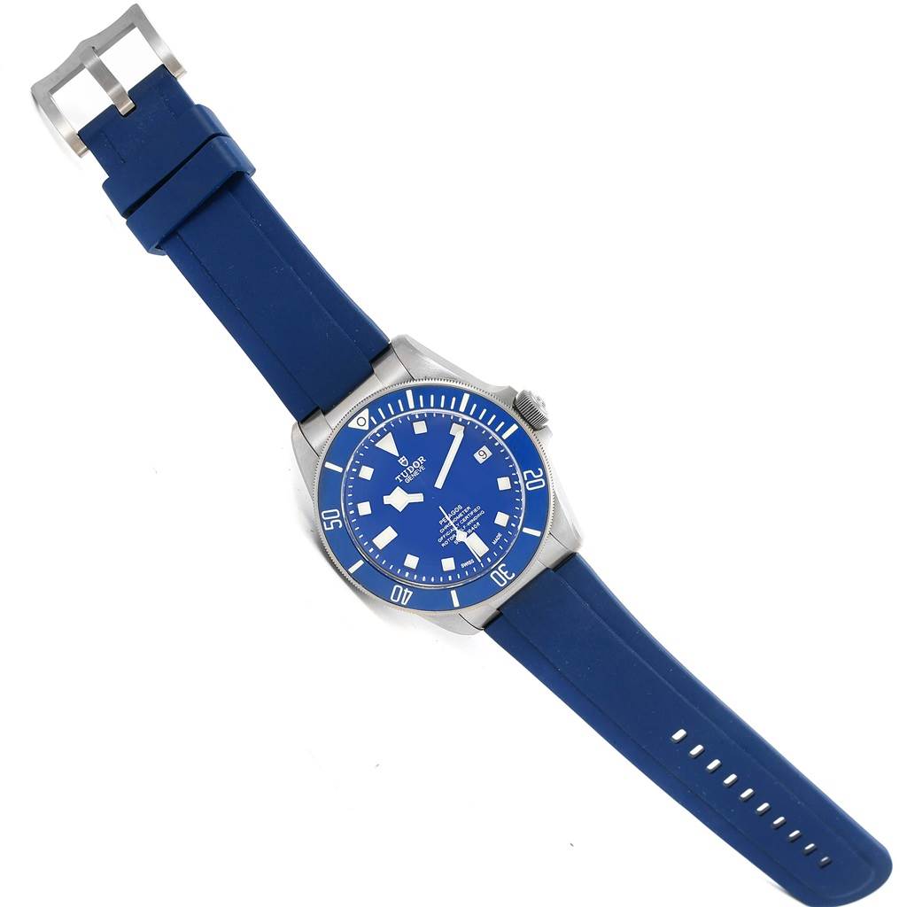 The image shows a Tudor Pelagos 25600TB Men's Titanium Blue Dial 25600TB Men's Titanium Blue Dial watch with a blue dial and blue rubber strap, viewed from a top angle.