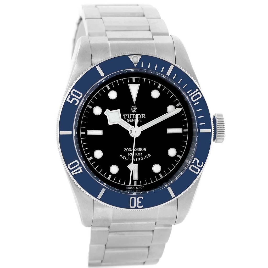 The image shows a front-facing view of the Tudor Heritage Black Bay 79220B Men
s Stainless Steel Black Dial 79220B Men
s Stainless Steel Black Dial watch, highlighting its dial, bezel, and bracelet.