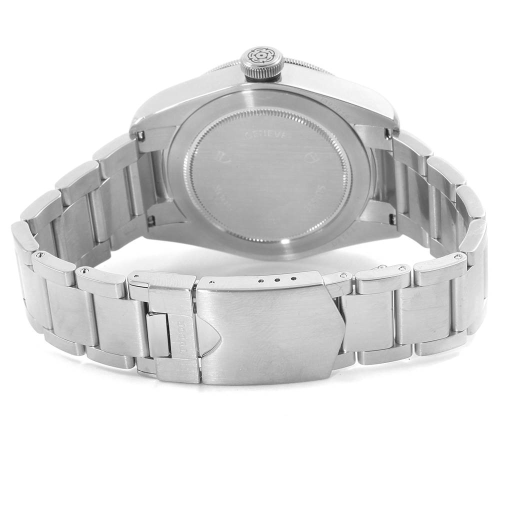 The image shows the back case and bracelet of the Tudor Heritage Black Bay 79220B Men
s Stainless Steel Black Dial 79220B Men
s Stainless Steel Black Dial watch from a rear angle.