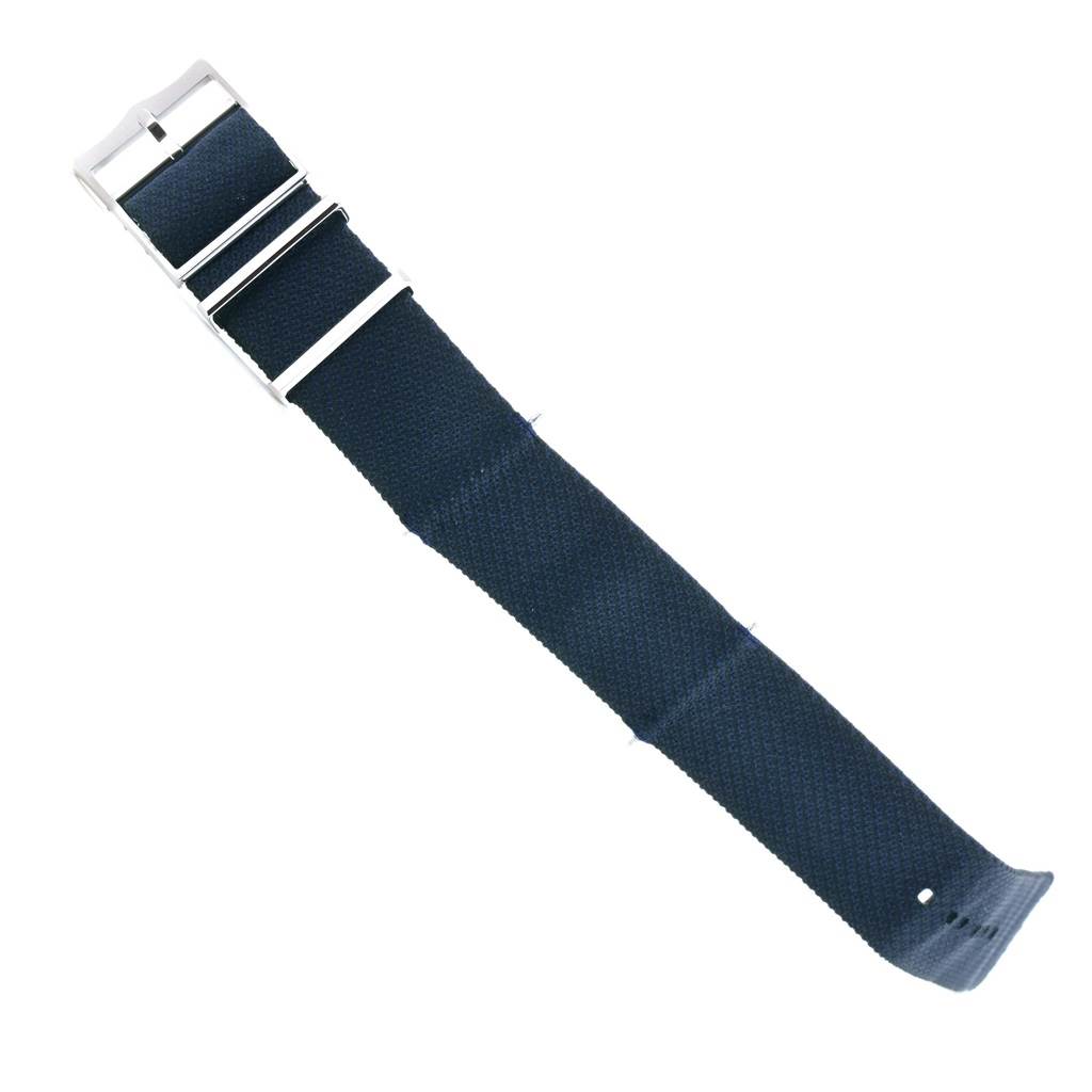 The image shows a blue textile strap with a buckle for the Tudor Heritage Black Bay 79220B Men
s Stainless Steel Black Dial 79220B Men
s Stainless Steel Black Dial watch.