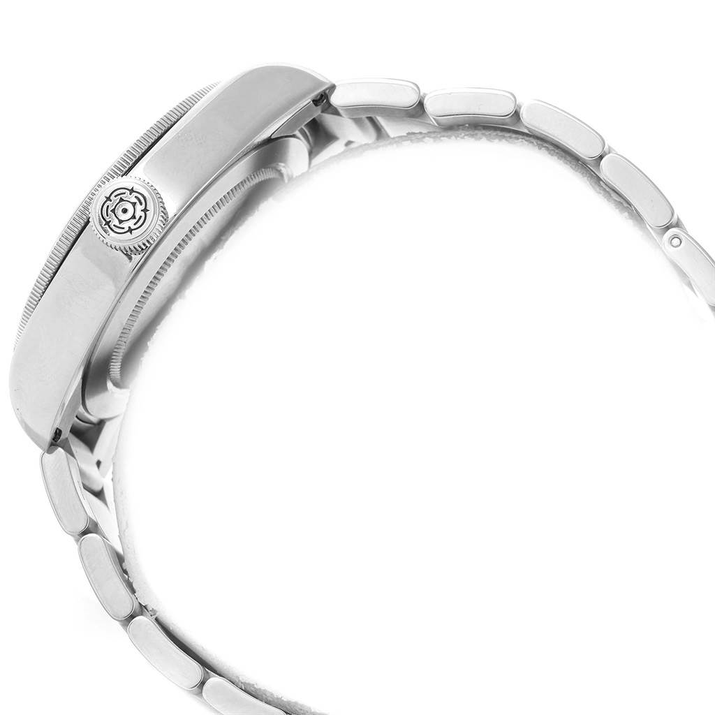 The image shows a side view of the Tudor Heritage Black Bay 79220B Men
s Stainless Steel Black Dial 79220B Men
s Stainless Steel Black Dial, displaying the case, crown, and bracelet.