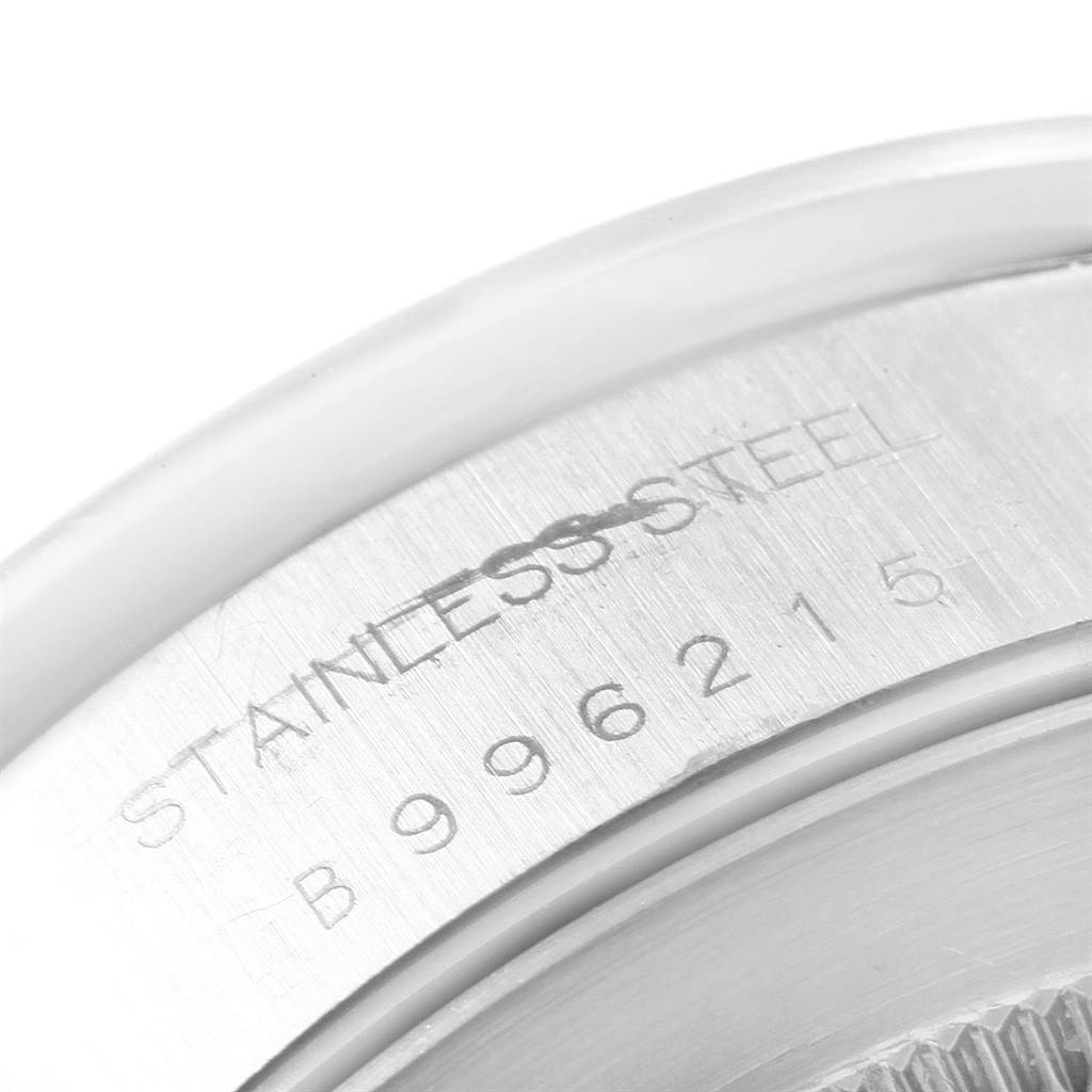 The image shows a close-up of the stainless steel back case with serial number engraving of a Tudor Tiger 79263 Men's Steel and Gold (two tone) White Dial 79263 Men's Steel and Gold (two tone) White Dial model watch.