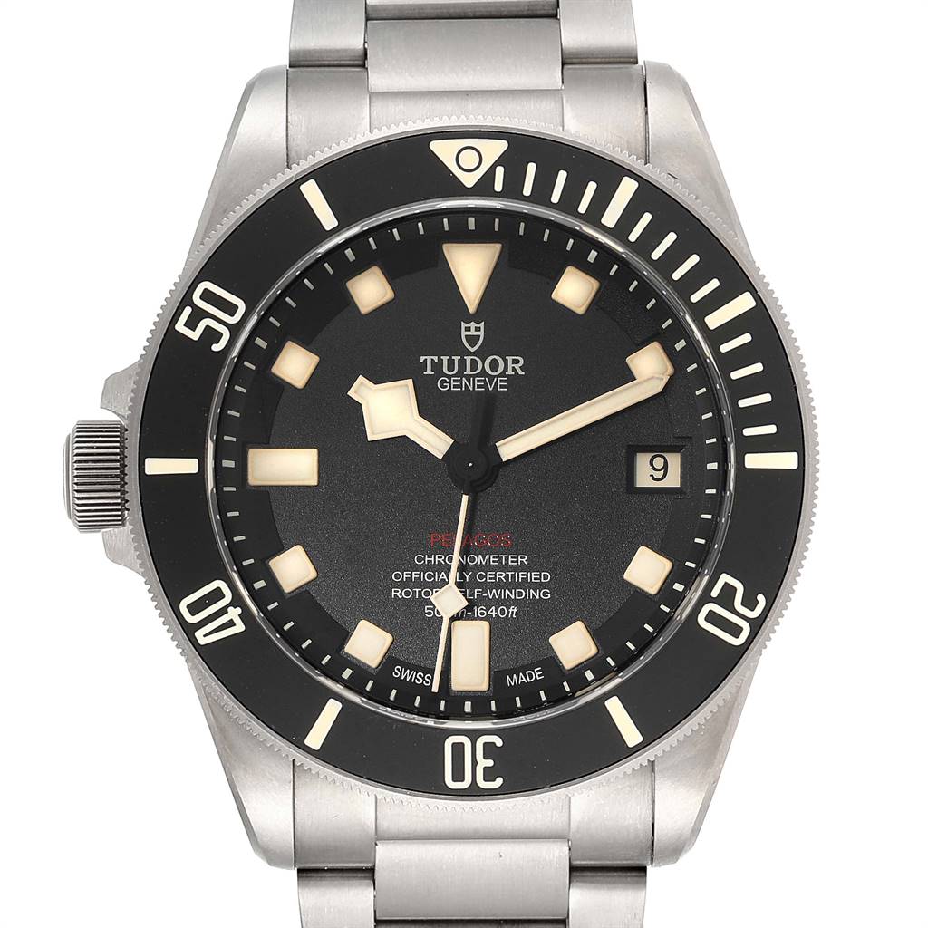 The image shows a front view of a Tudor Pelagos 25610TNL Men's Titanium Black Dial 25610TNL Men's Titanium Black Dial watch, highlighting its dial, bezel, crown, and part of the bracelet.